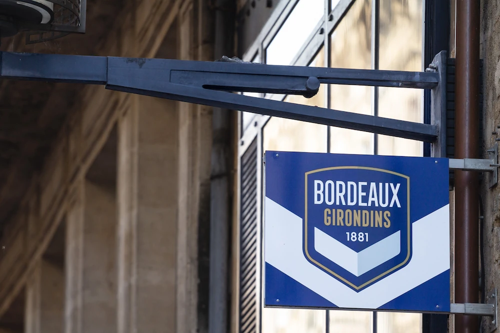 Escudo del Girondins de Bordeaux en un cartel