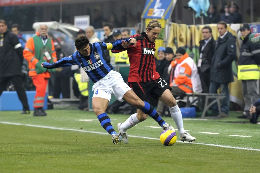 Massimo Ambrosini (Milan) y Javier Zanetti (Inter)