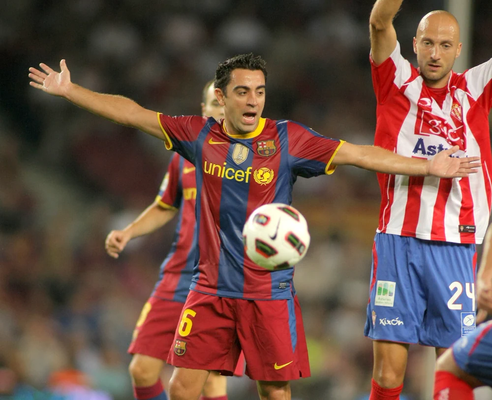 Xavi jugando en el Barcelona